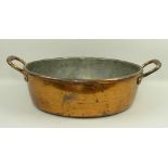 A Victorian copper jam pan, 41 by 13cm.