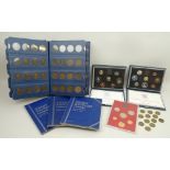 A quantity of coins including pennies, farthings, Royal Mint presentation packs, a Sandhill Coin