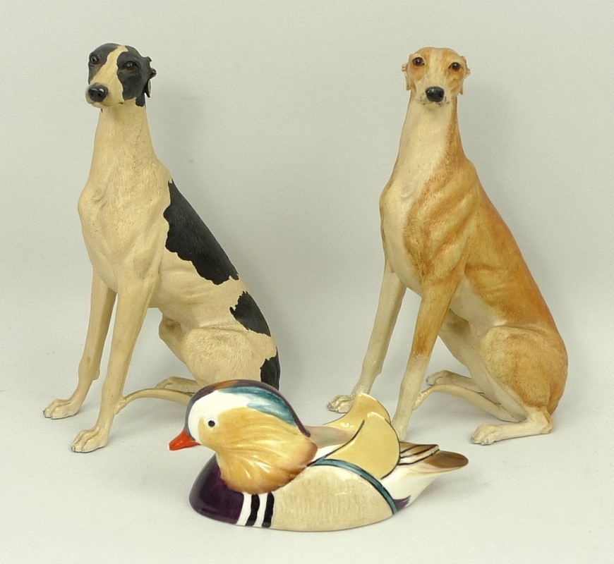 A Border Fine Arts Dogs Galore figure of Greyhound DG30 in black and white, and another DG30C in