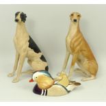A Border Fine Arts Dogs Galore figure of Greyhound DG30 in black and white, and another DG30C in