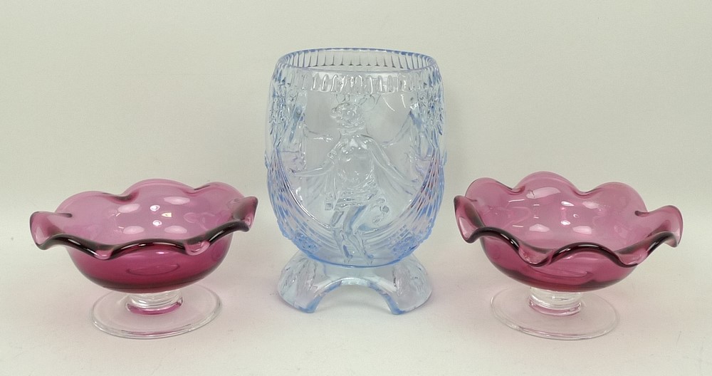A pair of Victorian cranberry glass pedestal sweetmeat dishes, 7 by 12cm, and an Art Deco pressed