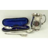 A silver tankard of baluster form, Chester 1902, christening spoon, Birmingham 1910, boxed, and a