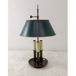 A mid 20th century brass bouillotte lamp with green painted metal tole shade, 35 by 59cm.