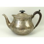 A Victorian silver teapot with bright cut engraved decoration, Martin & Hall & Co, London 1883,