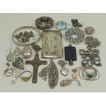 A quantity of silver and costume jewellery including a Georg Jensen heart shaped locket, a vintage