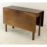 A Georgian mahogany drop leaf table, raised on square section supports, 106 by 42 (130 extended) by