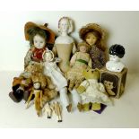 A Continental bisque head doll, late 19th century, with a composite body, four modern dolls,