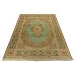 A Prado Orient Keshan Super Weave carpet, with mint green ground and rose and beige foliate