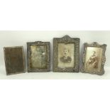 A collection of four Victorian and Edwardian silver photograph frames.