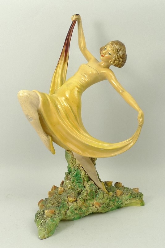 A Wade pottery figure, circa 1930, modelled as 'Springtime', printed mark, 23cm high.