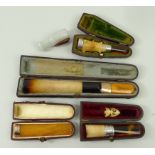 A French, Veritable Ecume, meerschaum and amber cigar holder with a gold ferrule, 16cm long, amber