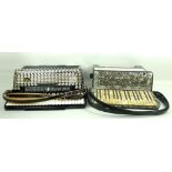An early 20th century Matelli piano accordion, and a Hohner Atlantic 4 piano accordion, cased.