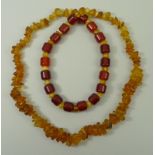 An amber necklace of cylindrical treacle amber beads, interspersed with butterscotch and honey