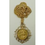 A Victoria head sovereign, 1892, in a 9ct gold pendant mount, on a kerb link chain, 24.9g.