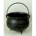 A late 19th century cast iron three ring cauldron, 34 by 25cm.