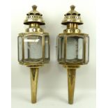 A pair of Victorian brass carriage lanterns, the glass panels engraved with floral motifs, 53cm.