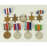 A quantity of WWII medals, comprising two 1939-45 Stars, two France and Germany Stars,