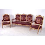 A Venetian style giltwood suite, comprising a three seater settee, 173 by 56 by 112cm high,