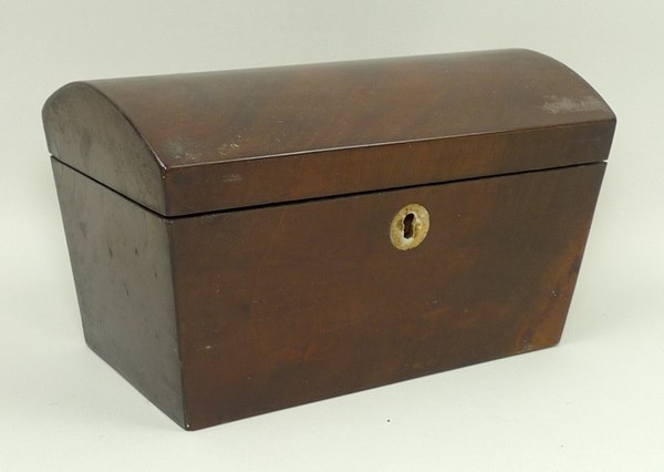 A walnut dome top tea caddy, 20 by 12 by 12cm.