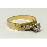 An 18ct gold and diamond solitaire ring, the 0.