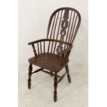 A Windsor chair, with high pierced splat back, and H stretcher, 104cm high.