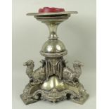 A Victorian silver plated epergne or comport stand, the triform base surmounted by three camels,