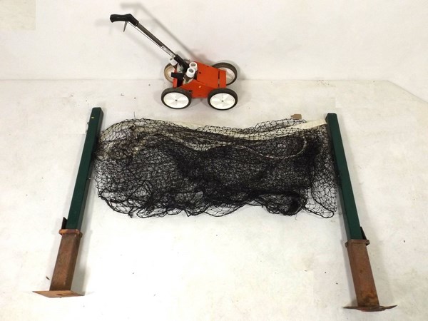 A mid to late 20th century Decathlon, Ely, tennis net with poles,