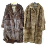 A three quarter length squirrel fur coat, and a further fur coat.