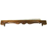 A carved mantel or pelmet, 151 by 28 by 15cm high.