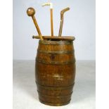 An oak and brass bound barrel converted to a stick stand, 63cm high,