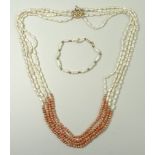A freshwater pearl, coral and gold bead multistrand necklace with 14ct gold clasp,