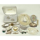 A quantity of costume jewellery including a string of seventy cultured pearls with a 9ct gold clasp,
