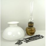 A Johnson Burton & Theobald brass oil lantern with glass funnel, 55cm, opaque shade, 36 by 23cm,