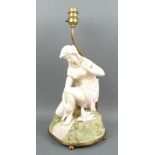 A parian figural table lamp, late 19th century, modelled as a semi clad lady bathing in a stream,