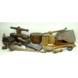 A quantity of treen including a 19th century peat shovel, a press, candle box,