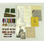 A group of medals, war diaries and associated WWII memorabilia relating to Captain James Alexander,