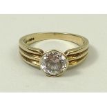 A 9ct gold and zircon set solitaire ring, size O, 3.2g.