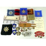 A quantity of militaria including cap badges, buttons, three Scottish Regiment ashtrays,