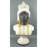 A pottery bust, 20th century, modelled as a Blackamore bust, on a pottery socle, 60cm high.