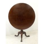 A George III mahogany tilt top occasional table, with birdcage action,