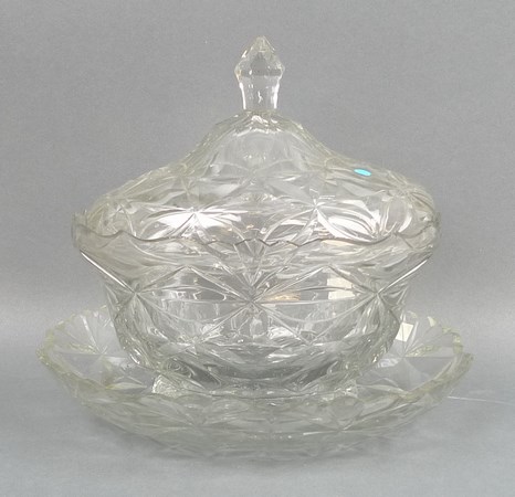 An Irish glass box, cover and stand, mid 19th century, of oval form, 23 by 21cm.