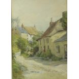 Clara J Worsdell: a thatched cottage village scene, signed lower left, watercolour, 18 by 12cm.