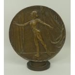 A 20th century bronze roundel depicting Antony Dowell, and Antoinette Sibley, ballet dancers,