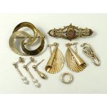 A 9ct gold triple scroll brooch, pair of fan shaped earrings,