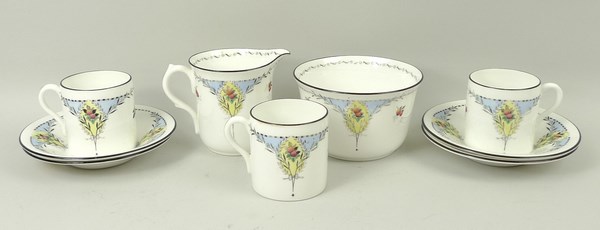 A Shelley porcelain part coffee service printed with fruit, pattern no 11560, comprising cream jug,