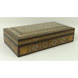 An early 20th century Syrian parquetry box inlaid with geometric designs with specimen woods, bone,