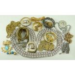 A quantity of costume jewellery including a paste set belt, kerb link bracelets,