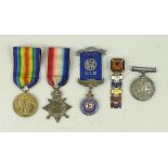 A WWI British trio of medals comprising 1914-15 Star, War and Victory medals to GNR RT Bourne,