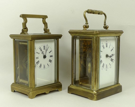 A brass cased carriage clock, late 19th century, enamel dial bearing Roman numerals,