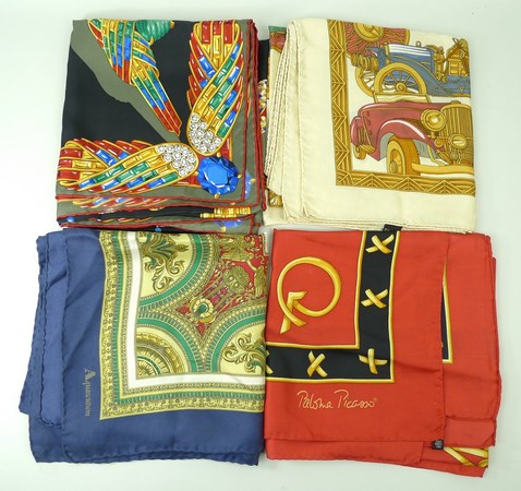 A collection of designer silk scarves, including a Must de Cartier Jewel Scarf,